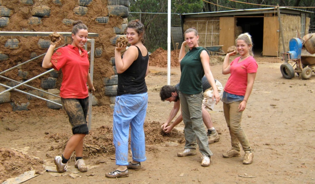 WWOOFers build a sustainable mud workshop, embodying communal spirit and an earth-centred connection to Kindlehill and the land.