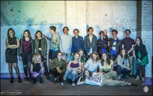 Kindlehill high schoolers celebrate their warehouse theatre production, radiating creative expression, resilient spirit, and a deep community bond.