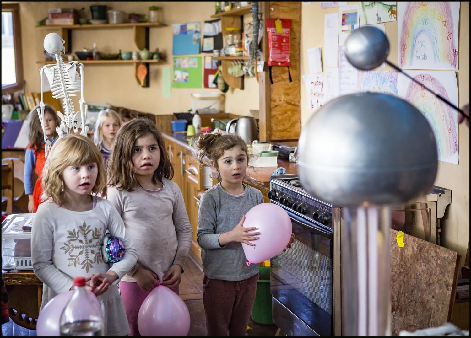 Wide-eyed students discover the wonder of physics during a community-led Science Day workshop, awakening curiosity and scientific inquiry.