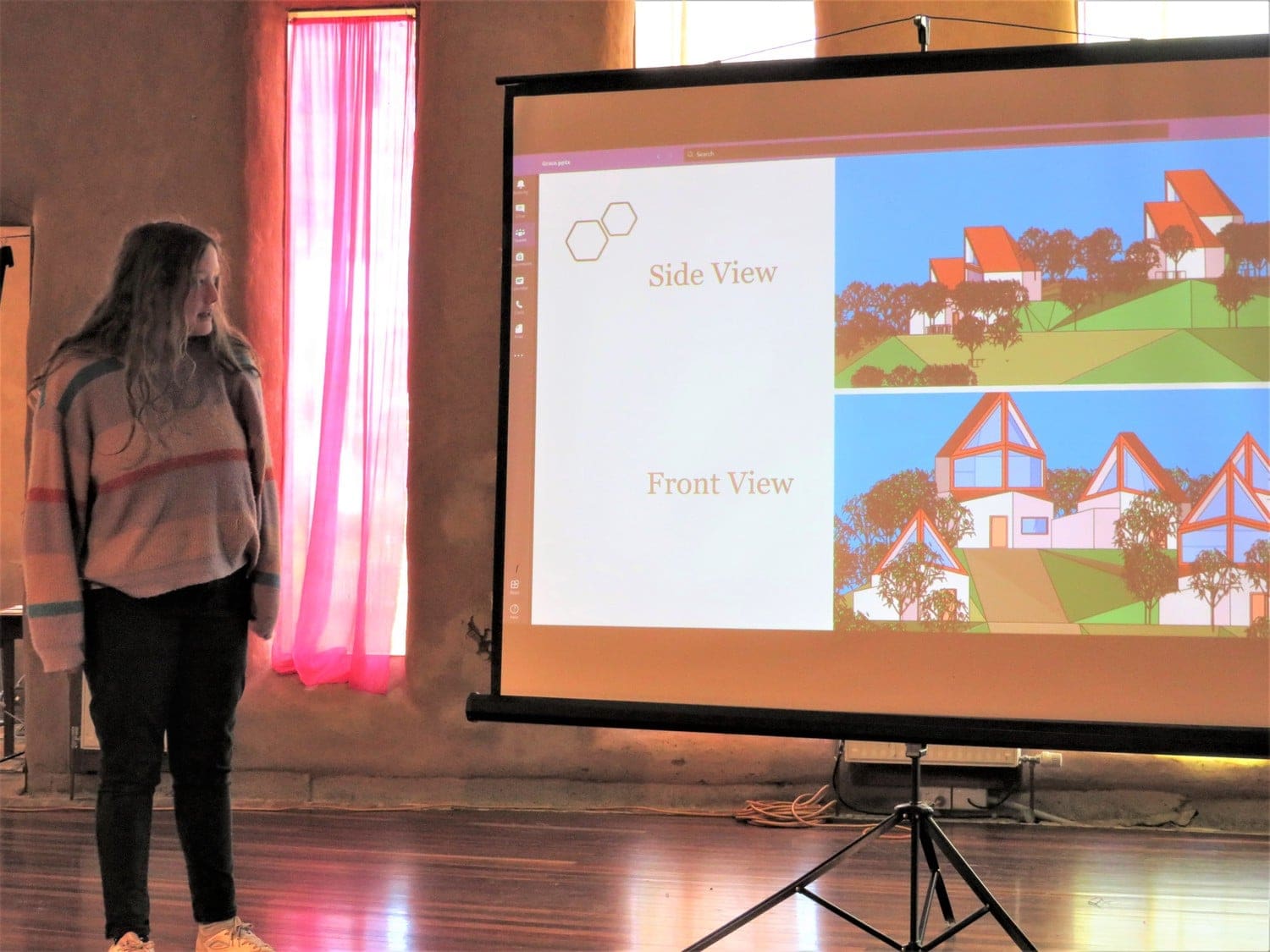 A student presents a sustainable design project, visualising a more beautiful world through creative and empowered action.