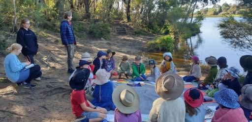 Kindlehill students foster connection at Wentworth Falls Lake, gathering in a bushland circle for nature-based learning and storytelling.