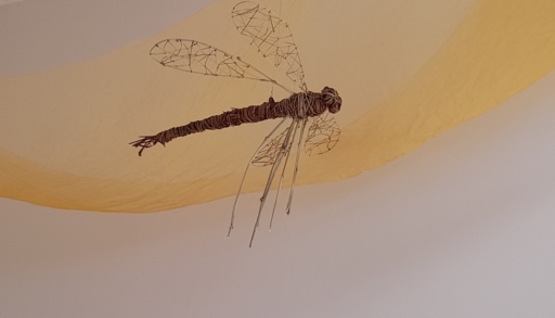 Handcrafted wire dragonfly symbolises artistic expression and nature-centred learning within the Kindlehill High School community.