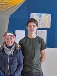 A Kindlehill teacher and student smile together, reflecting a nurturing, one-on-one connection for personalised academic and creative growth.