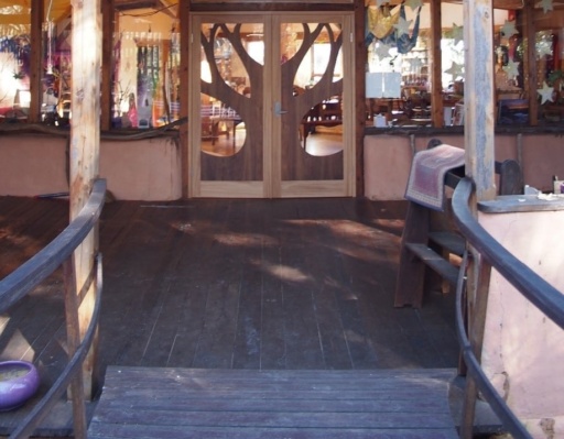 Handcrafted Kindy doors with Blackwood tree motifs honour the schools deep connection to nature and community spirit.