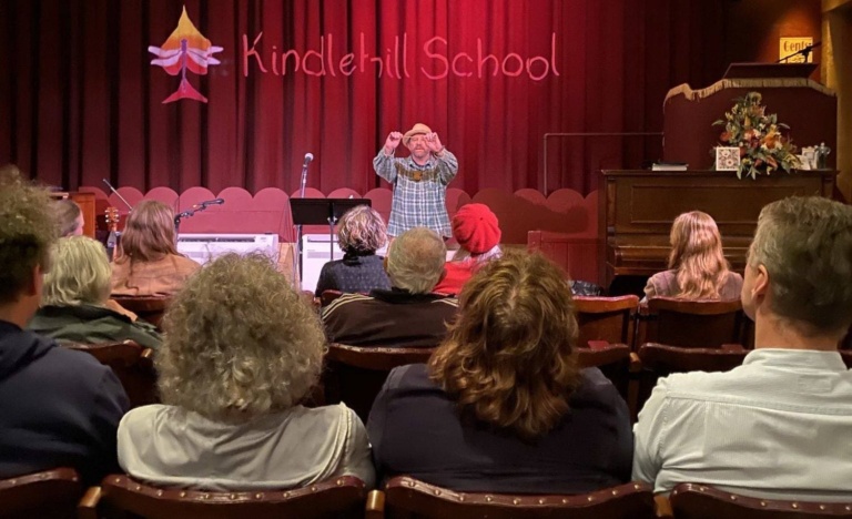 A storyteller engages the Kindlehill community, fostering connection and imagination during the Senior School launch celebration.