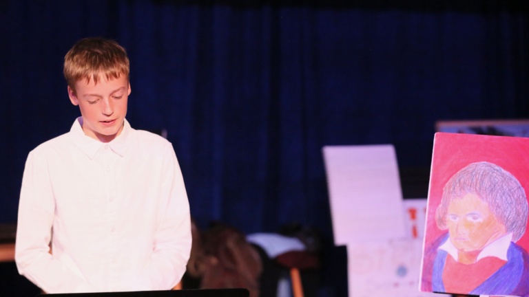 Confident Class 6 student presents his Big Project, showcasing the culmination of his curiosity through art and storytelling.