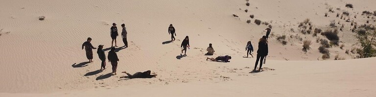 Kindlehill students explore vast dunes, connecting with the ancient spirit of Country through shared wonder and outdoor adventure.