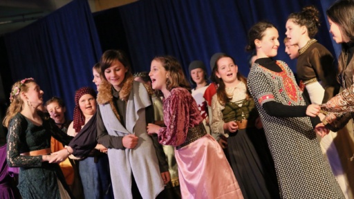 Class 6 students perform The Werewolf Knight, demonstrating imagination and community spirit through song and collaborative theatre.