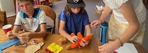 Students intently sew unique dolls, practising focus and creativity through the artistic Kindlehill Steiner handwork curriculum.
