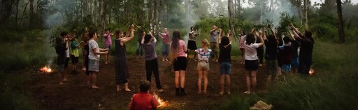 Kindlehill students and parents perform a bush ceremony, honouring Country and fostering a deep sense of community connection.