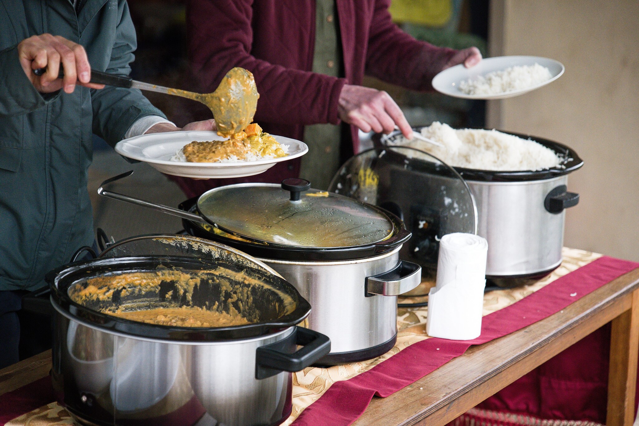 Community members share nourishing homemade meals, embodying a spirit of togetherness and cooperation at Kindlehill.