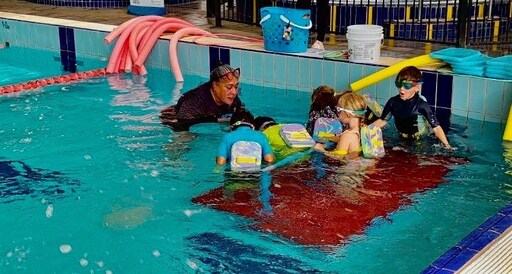 Kindlehill students courageously build resilience and water confidence, practising essential swimming skills in a supportive community environment.