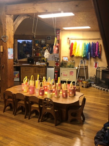 Hand-painted star lanterns celebrate Dharug seasonal rhythms, connecting community and Country through artistic expression and warmth.