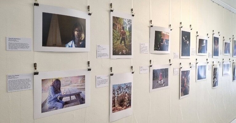 Blue Mountains youth celebrate their unique identities and community connection through creative photographic portraits at a local gallery.