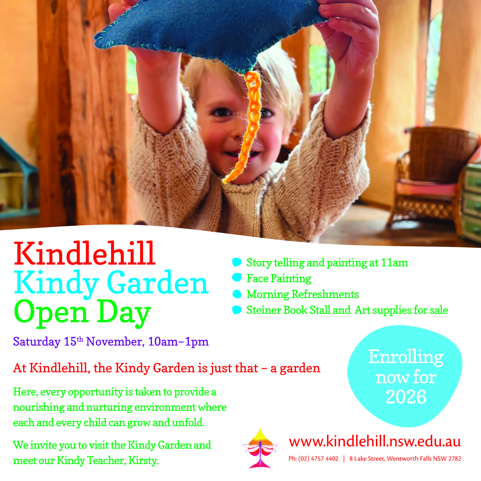 A smiling child displays a handmade blue bird, celebrating the creative imagination and nurturing spirit of Kindlehill.
