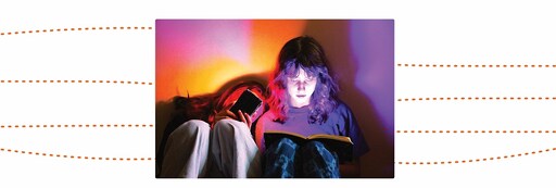 Young friends express their identity through connection and creativity, bathed in a warm glow of colourful, artistic light.