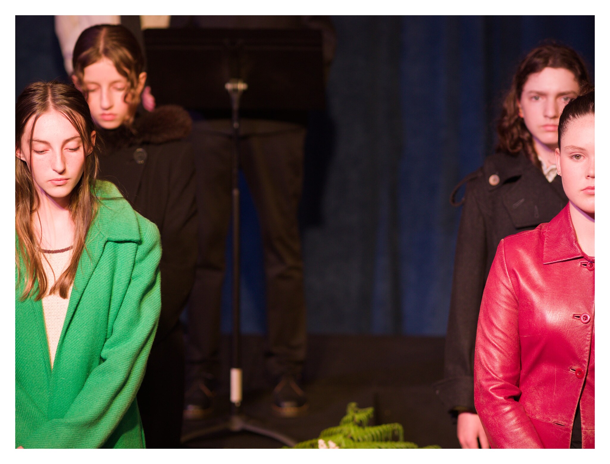 Focussed students deliver a sombre contemporary performance of Antigone, honouring ancient storytelling through powerful creative arts and resilience.