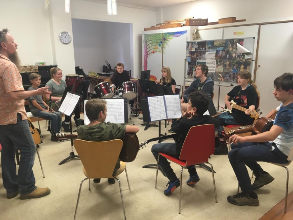 Students practise rhythmic connection and cooperation, creating music together as a vital community breath at Kindlehill.