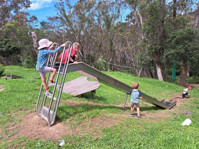 Children foster resilience and deep connection to land through adventurous play amongst the local Blue Mountains bushland.