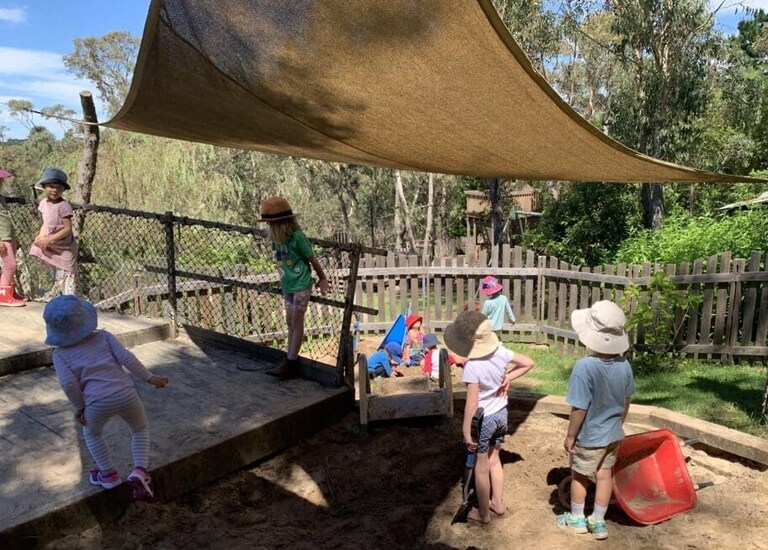Kindlehill students cultivate connection and wonder through collaborative play within their sheltered Blue Mountains bushland schoolyard.