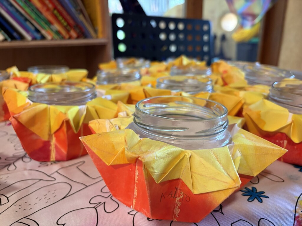 Handcrafted paper lanterns symbolise Kindlehills seasonal rhythms, honouring the connection between creativity, land, and the community village.