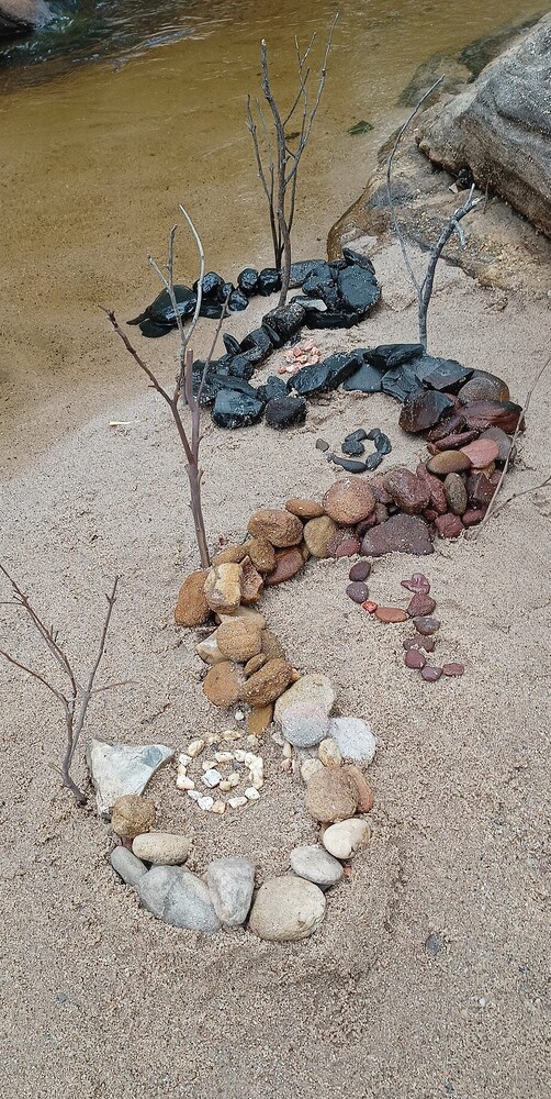 Natural stone serpent honours Wiradjuri Country, reflecting students deep, creative and mindful connection to the land.